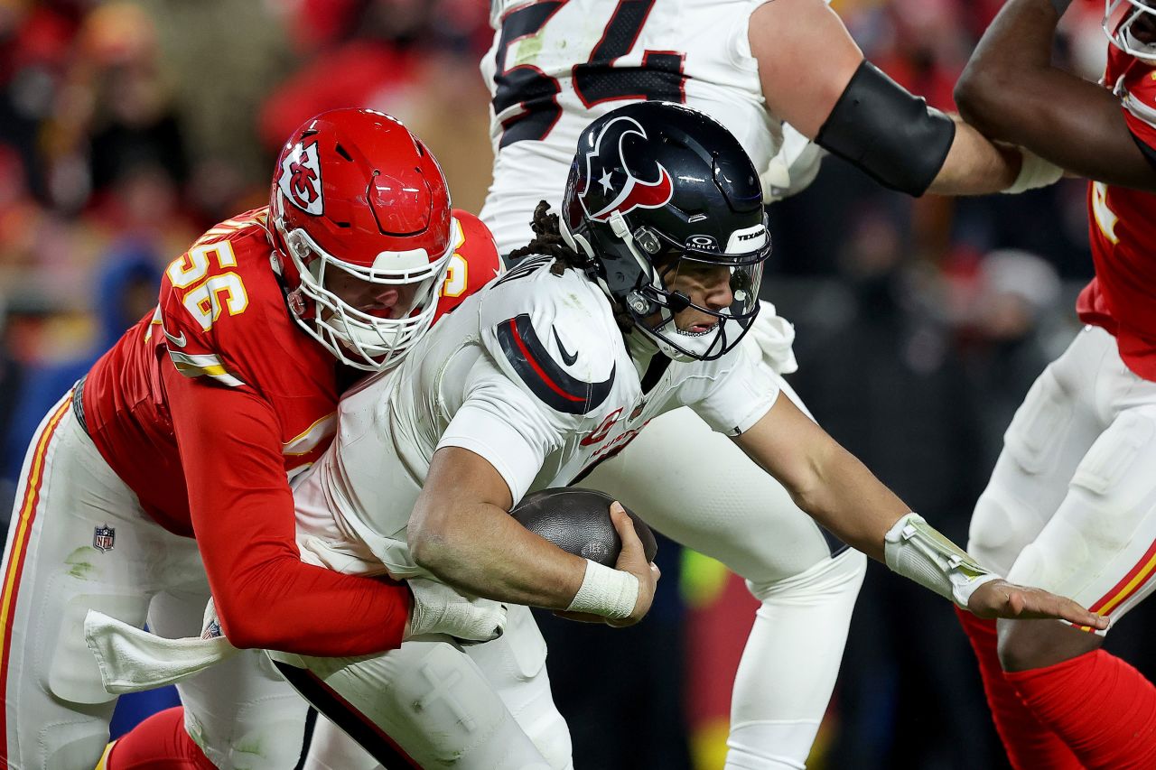 Kansas City Chiefs defensive end George Karlaftis sacks Houston Texans quarterback CJ Stroud.