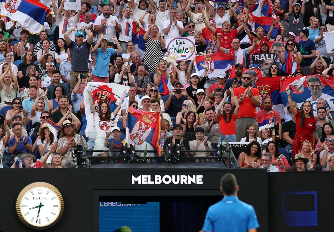 Fans cheer for Djokovic at the Australian Open.