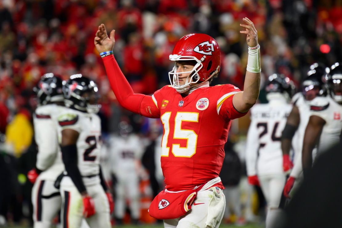 Kansas City Chiefs quarterback Patrick Mahomes urges the crowd to make noise as they run down the clock in their game against the Houston Texans.