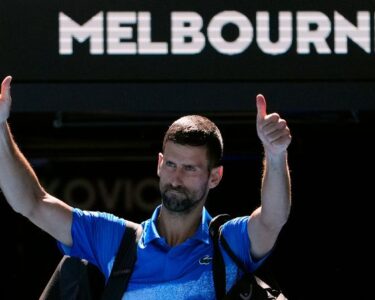 Novak Djokovic plays a forehand return to Alexander Zverev during their semifinal match at the Australian Open.