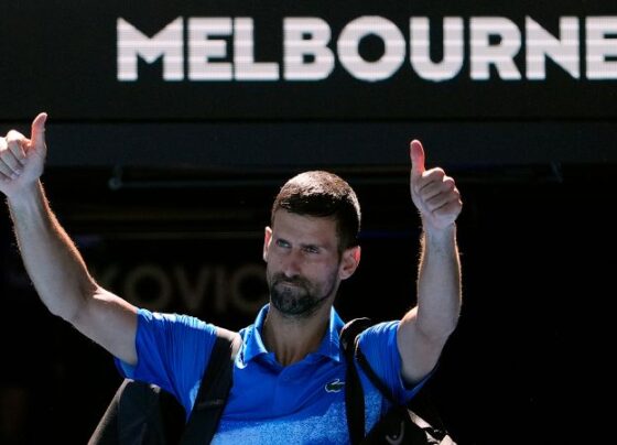 Novak Djokovic plays a forehand return to Alexander Zverev during their semifinal match at the Australian Open.