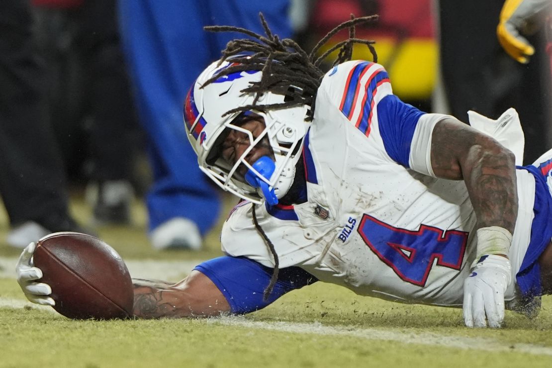 Buffalo Bills running back James Cook (4) scores on a 1-yard run during the second half of the AFC Championship.