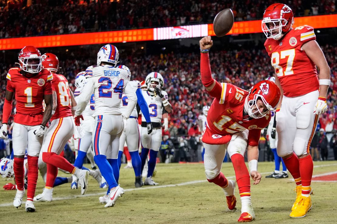 Kansas City Chiefs quarterback Patrick Mahomes (No. 15) celebrates his touchdown with teammate Travis Kelce (87) during the second half of the AFC Championship.