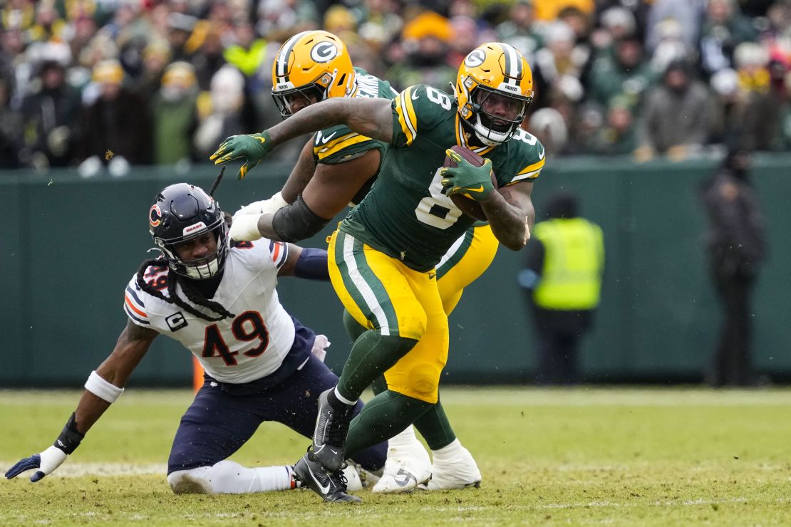 Jan 5, 2025; Green Bay, Wisconsin, USA; Green Bay Packers running back Josh Jacobs (8) during the game against the Chicago Bears at Lambeau Field. Mandatory Credit: Jeff Hanisch-Imagn Images