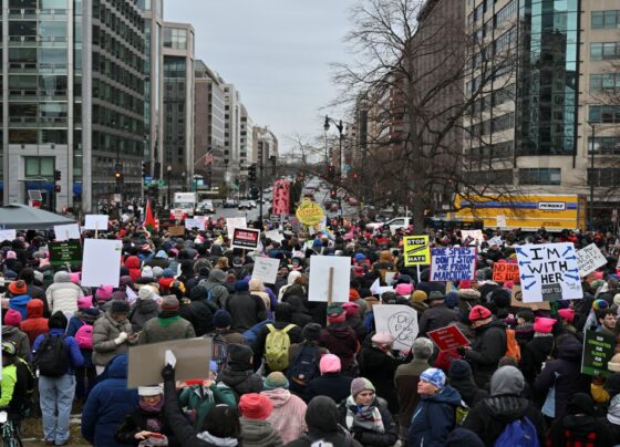 Thousands converge on Washington for a march days before Trump takes office