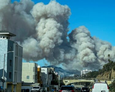 Wind-whipped fire in L.A. prompts evacuations in Pacific Palisades