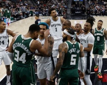 Milwaukee Bucks forward Giannis Antetokounmpo drives to the basket against San Antonio Spurs center Victor Wembanyama.