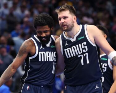 Irving (right) will now be the primary source of offense for the Mavericks after Dončić's departure.