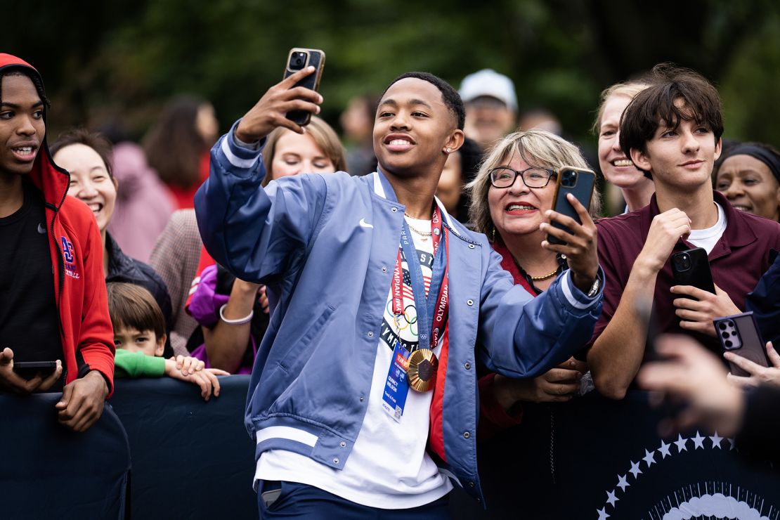 Wilson takes photos with fans during a White House visit on September 30.