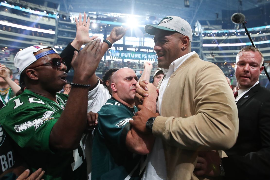 Australian rugby player Jordan Mailata greets fans after being selected by the Philadelphia Eagles during the 2018 NFL Draft on Saturday, April 28, 2018 in Arlington, Texas. (Ben Liebenberg via AP)