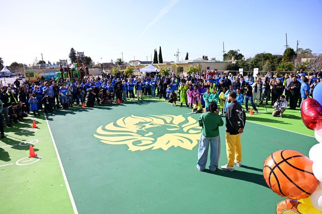 Ayesha Curry and Stephen Curry speak during the NBA Cares Day of Service and Legacy Projects on Friday.