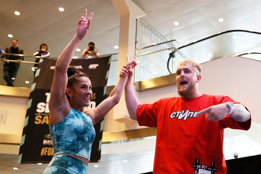 Paul introduces Amanda Serrano during a public workout, held days before her world lightweight title fight in April 2022.