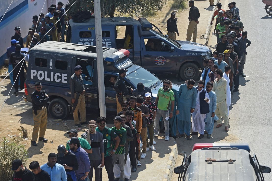 Spectators queue to enter the National Stadium in Karachi, Pakistan on February 19, 2025, ahead of the ICC Champions Trophy one-day international cricket match between Pakistan and New Zealand.