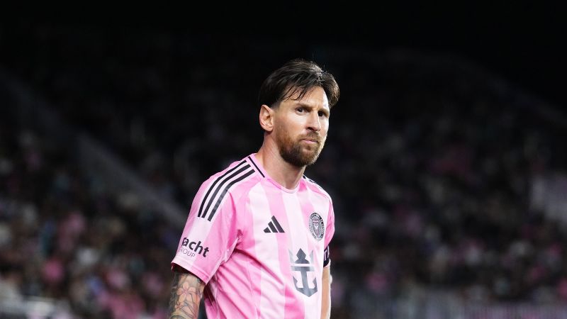 Lionel Messi fined for grabbing the neck of an opposition coach | CNN