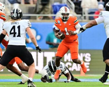 After winning the Heisman trophy, Hunter (No. 12) will be a player to keep an eye on at the Scouting Combine.