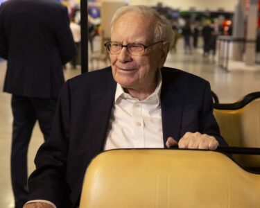 Berkshire advances on earnings surge, but questions linger about cash