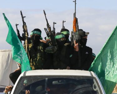 Hamas hands over three Israeli hostages to Red Cross in central Gaza