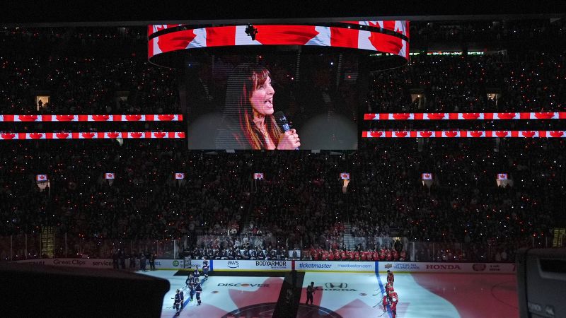 Singer Chantal Kreviazuk changes lyrics of Canadian anthem at hockey game to protest Trump’s 51st state remarks | CNN